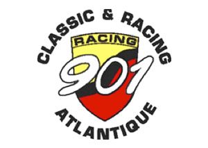 Logo composé d'un bouclier jaune et rouge comportant le mot "RACING" et le chiffre "901" en gros caractères blancs. Autour du bouclier, les mots "CLASSIC & RACING ATLANTIQUE" sont inscrits en lettres noires.
